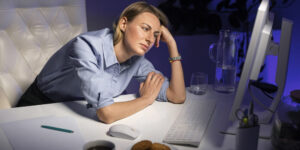 medium shot woman working late night 2